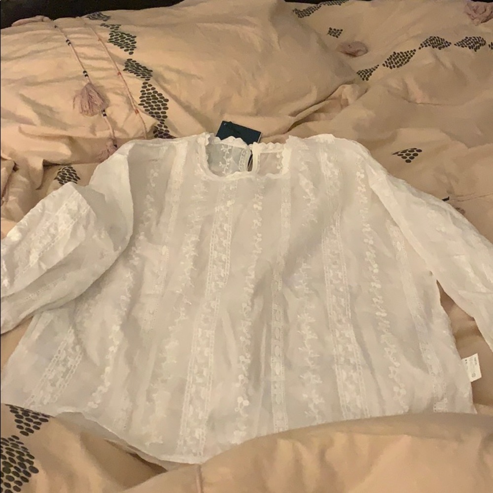 NWT. White long sleeve blouse with bell sleeves
